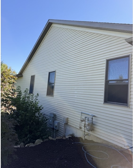 House & siding cleaning — after Spotless Wash restoration