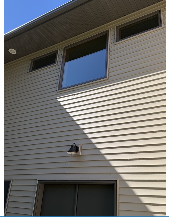 House & exterior window cleaning — after Spotless Wash restoration